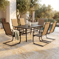 7-Piece Rectangle Outdoor Patio Dining Set with Padded Sling Chairs — Studio Shot